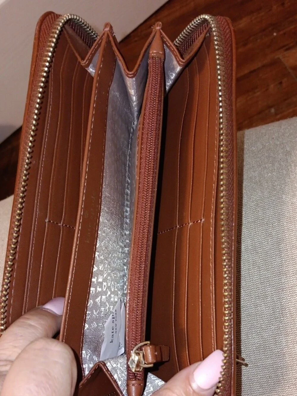 kate spade Brown Tassel Zip Around Leather Wallet